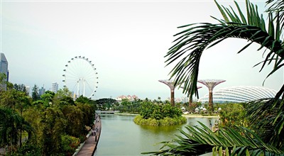 Singapore Flyer and Gardens by the Bay dome from the canal
